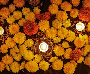 Brass Diyas with Marigolds image